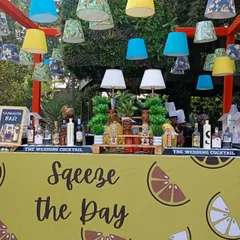 An example of our themed bar capabilities with a 'Squeeze the Day' lemon-themed setup for a vibrant Mehendi party. We can match any theme, from the bar front and decor to the drinks menu itself.