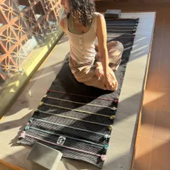 A reminder to slow down. Practice doesn't always have to be intense. Here I am setting up for a restorative session with my mat and blocks, ready to find some peace.