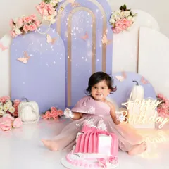 A butterfly-themed first birthday for a beautiful little girl. The soft pastel colors, floral details, and of course, the messy cake, made this a truly magical cake smash session.