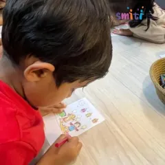 A young boy carefully colors a picture related to Eid. These quiet, creative moments help children reflect on the stories and significance of the festivals we celebrate.
