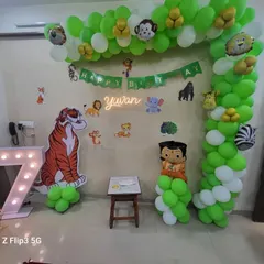 A fun jungle-themed party for Yuvan's 7th birthday, featuring characters like Sher Khan and Chhota Bheem. I created a green and white balloon arch with animal print accents and placed large character cutouts to make the kids feel like they're in a real jungle adventure.