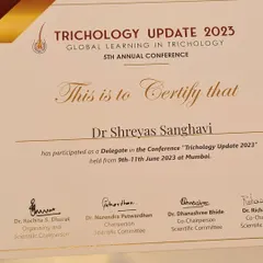 My certificate of participation from the Trichology Update 2023 conference. This event focused on global learning in the science of hair and scalp health, which is central to my practice.