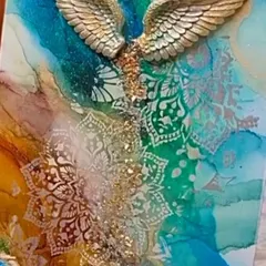 This is an example of how my 7-inch angel wings can elevate a piece of art. Here, they are the centerpiece of a vibrant alcohol ink and mixed media artwork, adding texture, depth, and a spiritual touch.