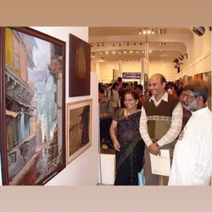 A cherished memory with my Guruvarya, Shri Vasudevji Kamath Sir, at an art exhibition. Learning from him has been a profound experience.