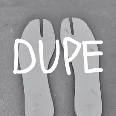 The split-toe insoles for the 'DUPE' Tabi flat, laid out before being placed in the shoe. Every component is carefully considered and crafted.
