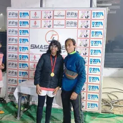 Our player with her coach after a successful tournament. We are proud of the hard work and dedication our female athletes show every single day.