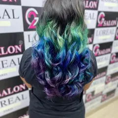 Don't be afraid to show your true colors. I specialize in vibrant, creative fashion hair coloring, blending shades like mermaid blue, green, and purple for a look that is uniquely you. Let's create something bold together.