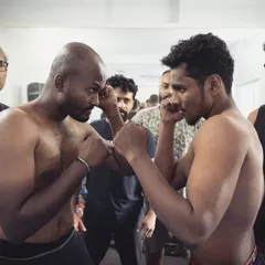 The face-off between two fighters before a WBC Muay Thai qualifier bout. This intense moment captures the spirit of competition we nurture in our gym.