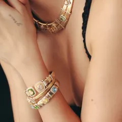 The star of our Antara X Jet Gems collection, the Sorbet Royale Set, is designed to steal the spotlight. This close-up shows the gem-studded Rainbow Collar and Bracelets, a playful yet classic design made to be collected and worn forever.