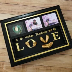 This 'LOVE' family sculpture is one of my favorite designs to create. Here, I combined the hand and foot casts of siblings Hithan and Thashvika with their photos to create a beautiful testament to their bond, all set in a classic black and gold frame.