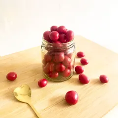 Tangy meets sweet in every bite of our cranberry panned nuts. These vibrant red treats are a delightful mix of crunchy nuts and a sweet-tart cranberry coating.