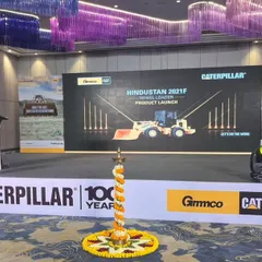 The stage setup for the Caterpillar 100-year anniversary and product launch. The design incorporates the brand's iconic colors and industrial feel, creating a powerful backdrop for a milestone event.