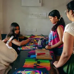 Here are some of our students deeply focused on their Iris Folding projects. It's a meticulous but very rewarding paper craft technique.