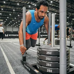 The sled push at Hyrox is a true test of leg power and grit. This is what functional strength training prepares you for.