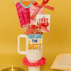 A gift for the 'Best Sister'. This creative hamper is built around a personalized mug and includes a scrunchie, chocolates, and other cute items to show your sister she's the best.