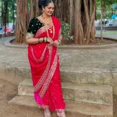 Embrace Maharashtrian heritage with this stunning pink velvet Nauvari saree. The traditional drape, combined with rich fabric and authentic jewelry, is a powerful statement of grace and cultural pride.