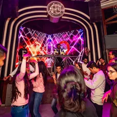 The crowd vibing to some trap music during a set with a fellow DJ. I love playing different genres and seeing how the energy on the dance floor shifts with the music.