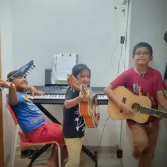 **The Joy of Making Music Together.** Our jam sessions are all about energy, fun, and collaboration. Students get to play their favorite instruments, from electric guitar to piano, in a supportive group setting.