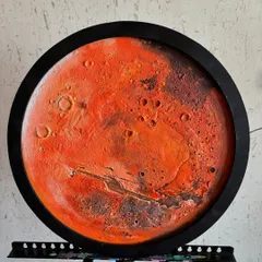 A close-up of the finished Mars lamp before the lighting is installed. You can see the rich, layered colors and the detailed texture work that mimics the Martian surface, all set within a sleek black frame.