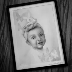 The final framed portrait, showing how the soft butterfly background adds a touch of magic to this baby portrait.