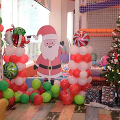 Our play zone transformed into a winter wonderland for Christmas. The festive decor, including a Christmas tree and Santa cutouts, set the perfect mood for our holiday carnival.