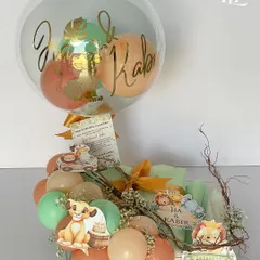 A Lion King themed hamper for Jia and Kabir's 3rd birthday. This gift is filled with playful toys, a personalized balloon, and safari-inspired decorations to bring their favorite movie to life.