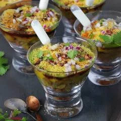 My chaat creations are a feast for the eyes and the palate. These chaat cups are layered with various textures and flavours, topped with sev and fresh coriander, and served with a fun pipette of yogurt.