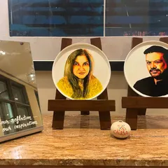 The two commissioned ceramic plate portraits displayed together. It was a wonderful opportunity to collaborate with ITC Gardenia and ArtMantram on this special project.