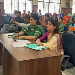 My judging process is one of deep observation and respect for each performer's journey. Here I am, fully engrossed in a performance at the School of Specialized Excellence, carefully considering the technical skill, creativity, and emotional depth of the presentation.