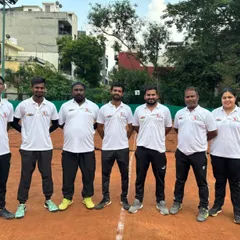 A formal photo of the ILTA coaching team on the court. We are a professional unit dedicated to the athletic and personal growth of our students.