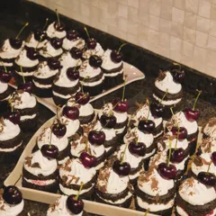 Another view of the Black Forest cupcakes. I pay close attention to making sure each one is perfectly assembled, so your guests get a consistent and delicious experience.
