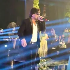 Singing my heart out for the happy couple and their guests. A wedding performance is all about creating beautiful, high-energy memories that will last a lifetime.