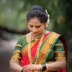 An elegant portrait of a woman dressed in a traditional saree for Vat Purnima. This photo captures a quiet moment of devotion and grace during the festival.