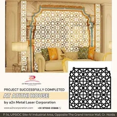 A successfully completed project at Atithi House featuring a large, ornate jali screen with an Islamic geometric pattern. The screen acts as a stunning backdrop for the living area, blending traditional design with a luxurious, modern setting.