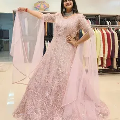 The full look of the pink embroidered gown, showcased in my store. You can see the intricate detail and flattering A-line shape that makes it a popular rental choice.