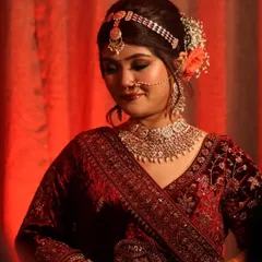 A softer moment capturing the full traditional look. The makeup is designed for longevity, ensuring it stays perfect through hours of shooting, which is essential for both weddings and long commercial production days.