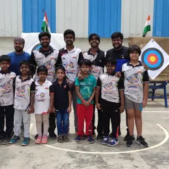 Posing with some of our youngest and most enthusiastic archers. It's a joy to coach them and be part of their journey in the sport.