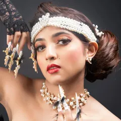 Another shot from the fantasy nail photoshoot, showing the intricate details of the nail jewelry and how it coordinated with the model's accessories.