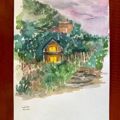 I love how mountain houses seem to glow in the evening. This watercolor painting captures a cozy home tucked away in the trees, with warm light spilling from its windows against a dusky pink sky.