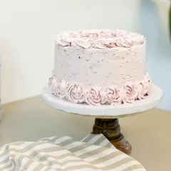 This vegan vanilla cake is layered with my own homemade strawberry jam. It's a simple, guilt-free treat that's pure love in every bite.