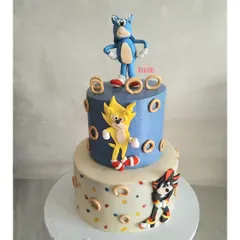 Shadow and Sonic are back! This epic two-tier cake was for Suveer’s 5th birthday. I’ve been baking for him since he was one, and it's a joy to see his interests change. This is a no-fondant cake with just a few fondant accents.