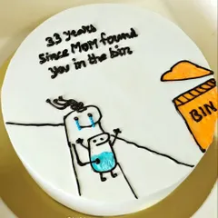 Another look at the "bin baby" cake. It's a perfect example of how a cake can be part of a fun inside joke between family members.