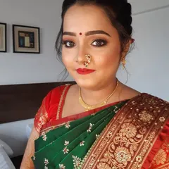 I have a special love for creating the perfect Marathi bridal look. This features classic soft glam makeup with a traditional nath and bindi, paired with an elegant braided hairstyle that is both beautiful and secure.