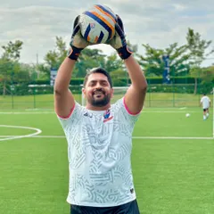 Coach Adhip demonstrates proper ball-handling technique. His hands-on approach and expertise have been instrumental in developing top-tier goalkeepers at our academy.
