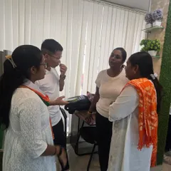 A small group of students engaged in a discussion during our Independence Day event. These informal conversations are crucial for practicing everyday English and building conversational skills.