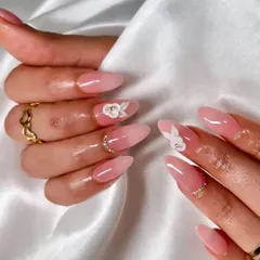 Another angle of these beautiful 3D floral nails, showing the detail of the sculpted flowers and the clean, glossy finish of the pink ombre extensions.