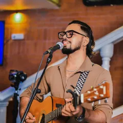 Another shot from a solo gig. I believe the right song at the right moment can create a magical atmosphere, and that is what I aim for in every performance.