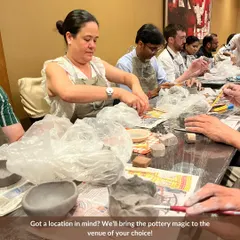 Your place or ours? We can bring the entire pottery experience to you. This image shows one of our offsite workshops, fully equipped with all the tools and materials needed for your group to get creative at a venue of your choice.