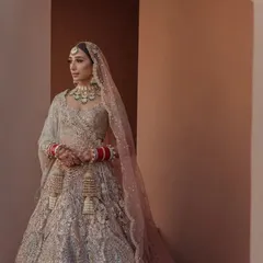 An elegant bridal portrait of Priya, framed by the beautiful architecture of the palace. We use the natural lines and colors of the venue to create timeless, editorial style photographs.
