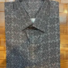 A custom-made formal shirt featuring a unique geometric print on 100% pure cotton fabric. I can help you find a print that expresses your personal style while maintaining a professional look.